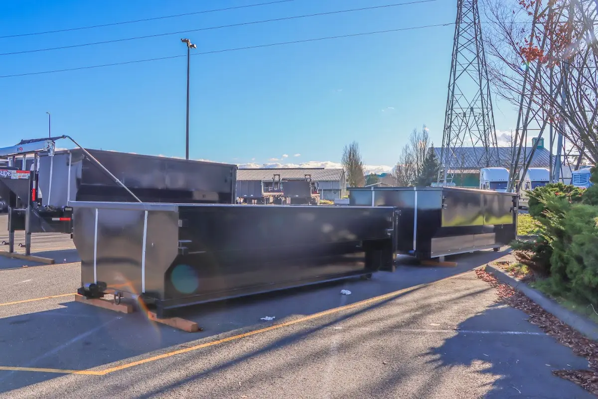 Roll-off dumpster ready for waste disposal at job site for Construction Dumpster Rental in Pelican Bay